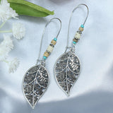 Silver geometric metal turquoise inlaid tassel earrings
