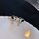 Skeleton love earrings