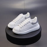 Couple ins McQueen little white shoes women's 2023 spring new student board shoes women's thick-soled breathable men's tide 6601