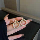 Diamond pearl letter D earrings