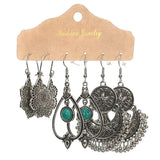 Snow tassel love wing earrings