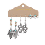Irregular silver butterfly tassel earrings