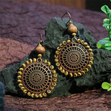 Fashion retro wooden beads hand-woven geometric hollow tassel earrings