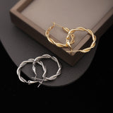S925 silver needle twist design earrings
