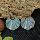 Irregular leaves hollowed out turquoise earrings