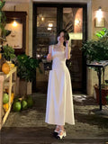 Geuxml   New Summer White Strap Long Dress Womens Fashion Slim Hollow Out Party Club Prom Vestidos Dresses Beach Bow Elegant A-line