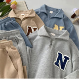 Momentlover  -  Summer Oversize Casual Fashion tracksuit Loose Waffle Suit Men Loose Short-sleeve tshirt + Sports Shorts Letter Print 2pcs Set