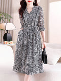 Momentlover Tied Waist Flower Print Elasticity Plus Size Loose V-neck Midi Dresses