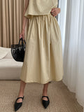 Momentlover Solid Color Loose Round-Neck Vest + High Waisted  Skirt Two Pieces Set