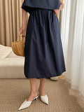 Momentlover Solid Color Loose Round-Neck Vest + High Waisted  Skirt Two Pieces Set